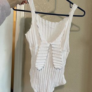 Shein white body suit, it’s a small